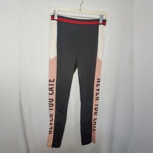 Pre-Loved Women’s Jirfen Red, White, Pink, and Black Leggings Size Medium